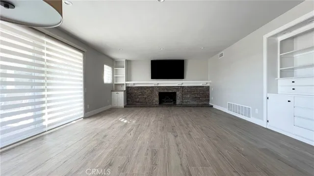 a view of livingroom with furniture and fireplace