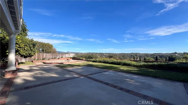 a view of a road with an ocean view