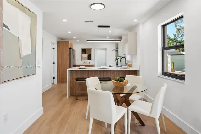 swimming pool view with a outdoor seating