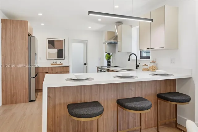 a view of a house with a yard porch and sitting area
