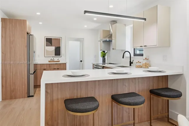 a view of a house with a yard porch and sitting area