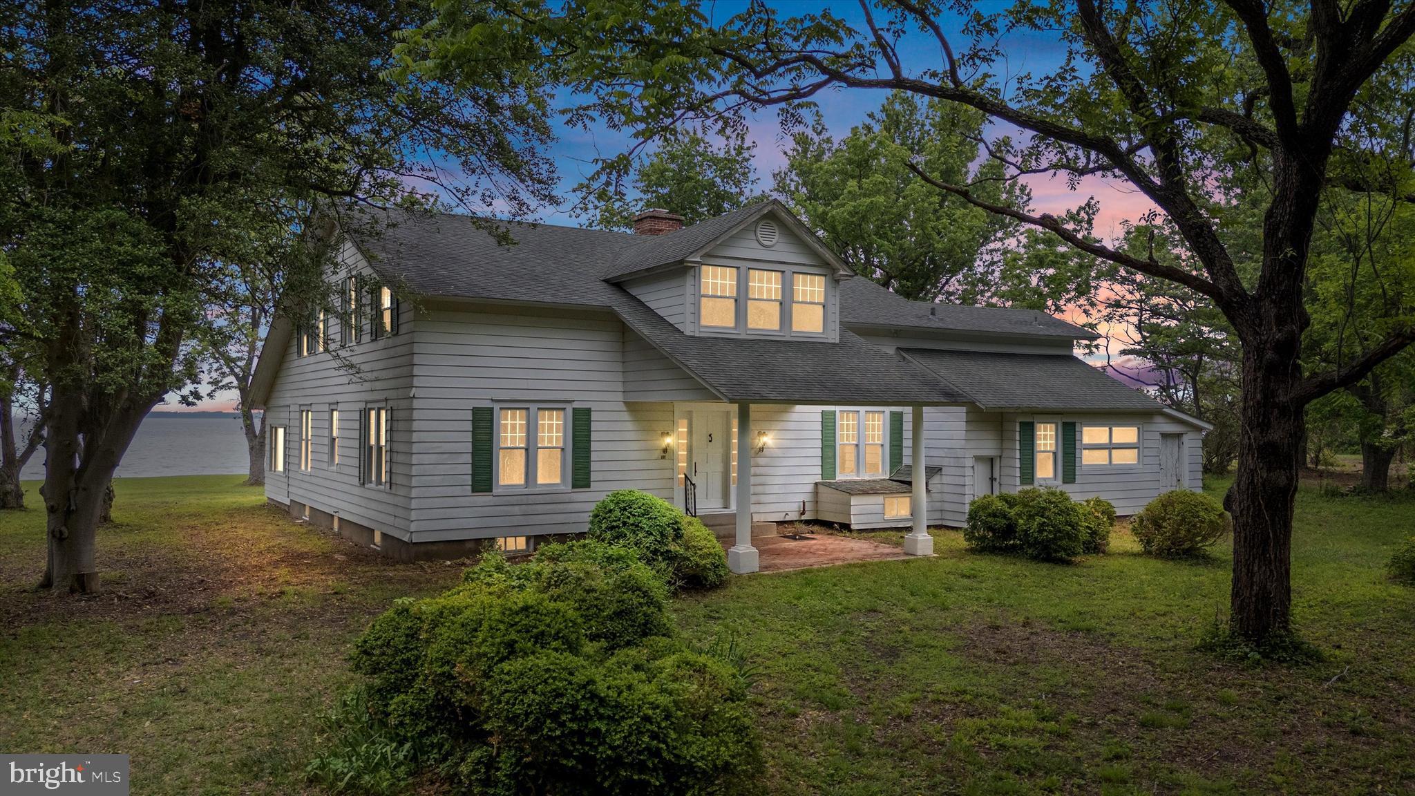500 Nesbit Road Queenstown, MD 21658 - Photo 1 of 53 a house view with a garden space