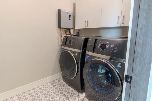 an empty room with closet and wooden floor