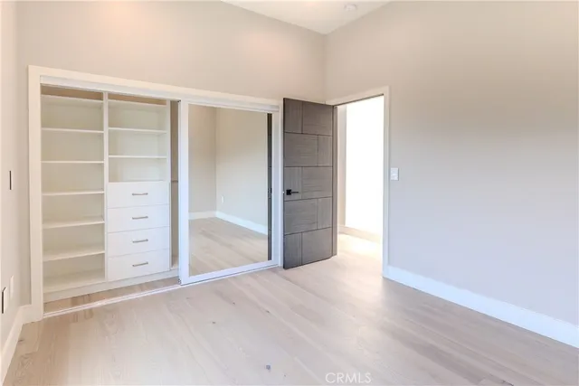 a kitchen with stainless steel appliances a sink stove and refrigerator