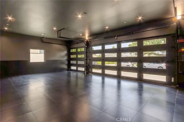 a view of an empty room with glass door