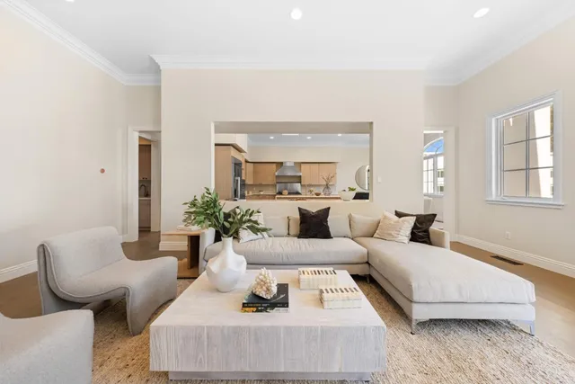 a spacious bedroom with a bed and a window