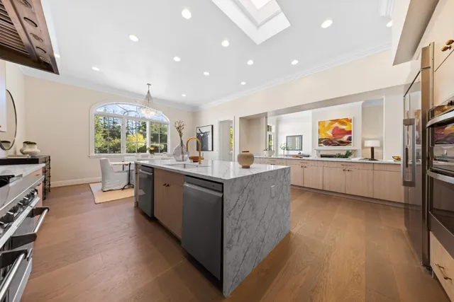 a view of an empty room with windows