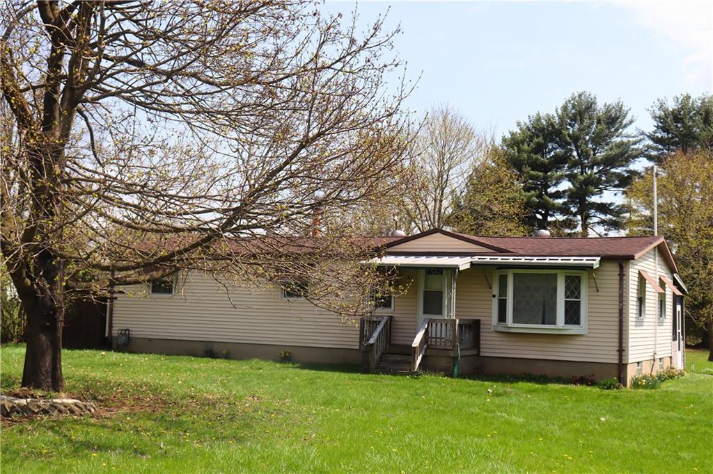 57 North Hope Mill Road Mercer, PA 16137 - Photo 6 of 49 a front view of a house with garden