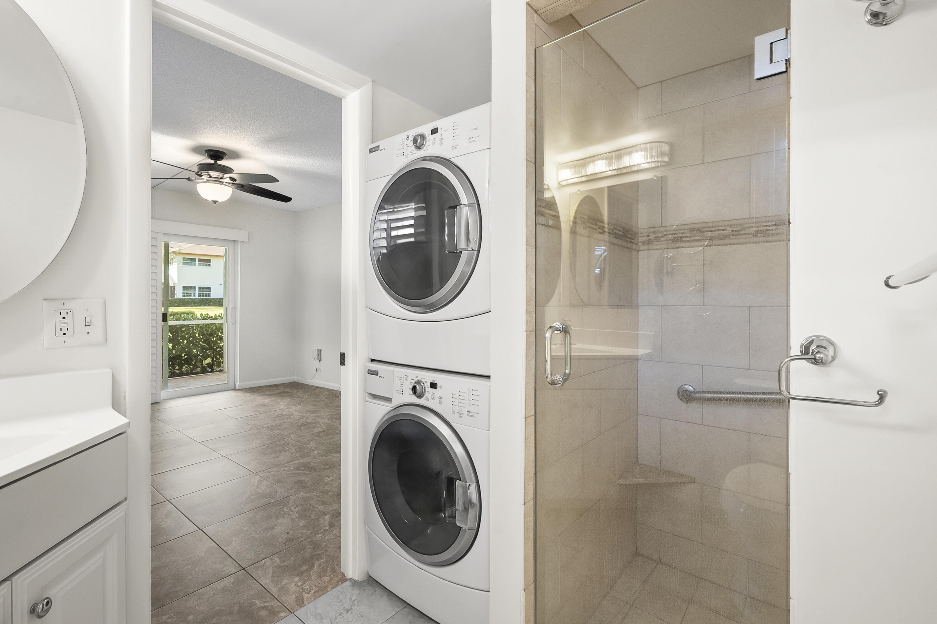 717 Highway 1, Unit 305 Jupiter, FL 33477 - Photo 11 of 51 a view of entryway with washer and dryer