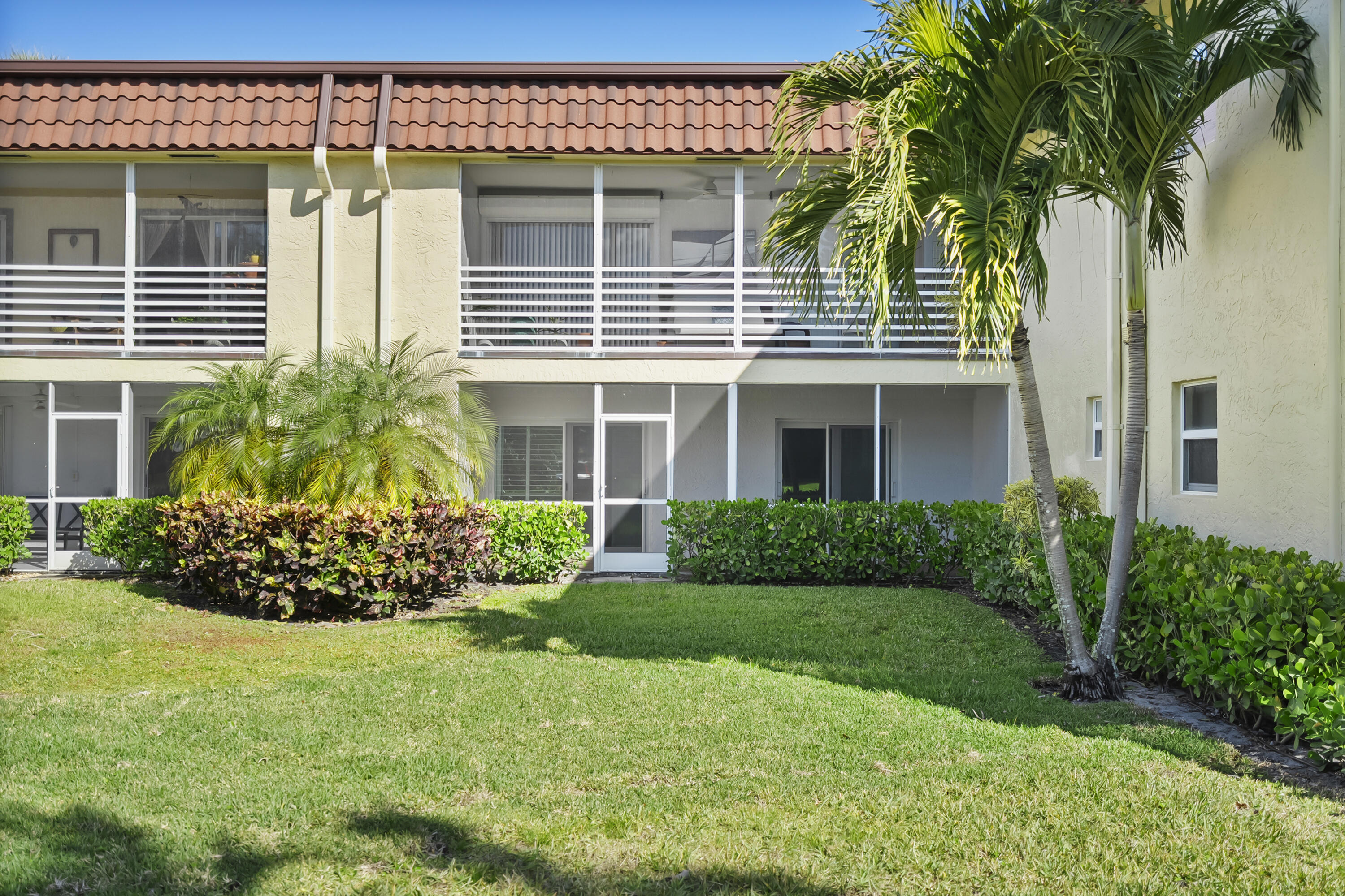 717 Highway 1, Unit 305 Jupiter, FL 33477 - Photo 35 of 51 a front view of a house with garden