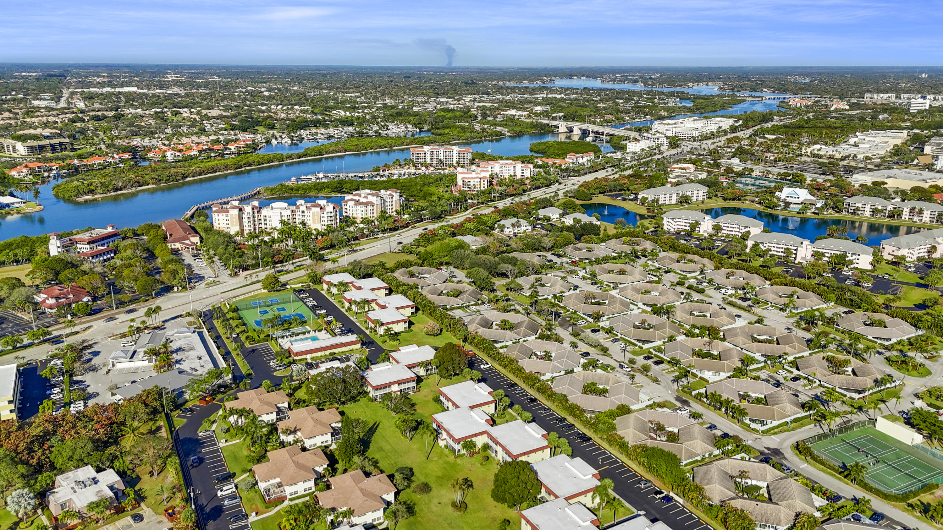 717 Highway 1, Unit 305 Jupiter, FL 33477 - Photo 50 of 51 an aerial view of residential building and lake
