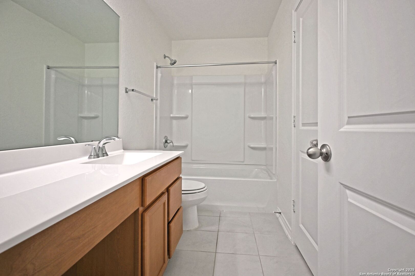 512 Dakota Creek New Braunfels, TX 78130 - Photo 19 of 38 a bathroom with a sink a toilet and shower