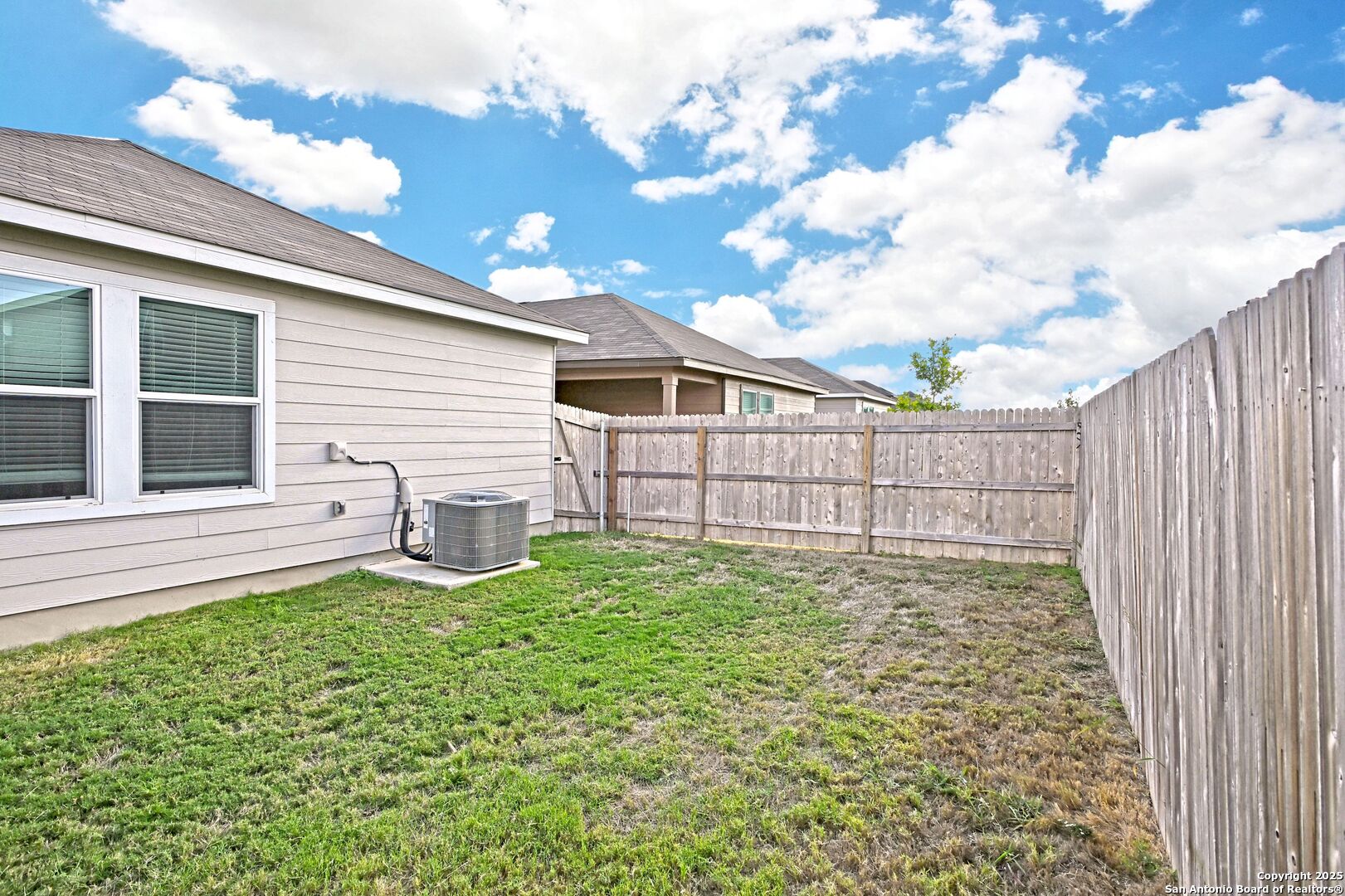 512 Dakota Creek New Braunfels, TX 78130 - Photo 31 of 38 a view of a backyard with a garden