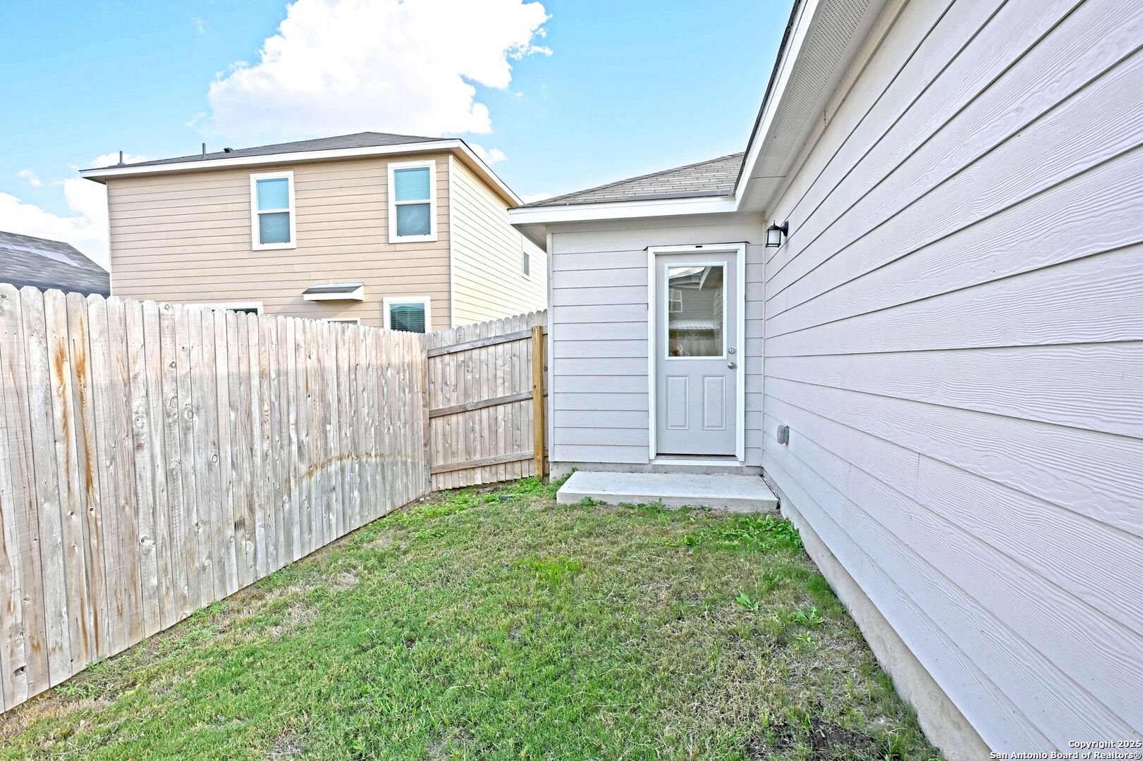 512 Dakota Creek New Braunfels, TX 78130 - Photo 34 of 38 a view of a backyard with wooden fence
