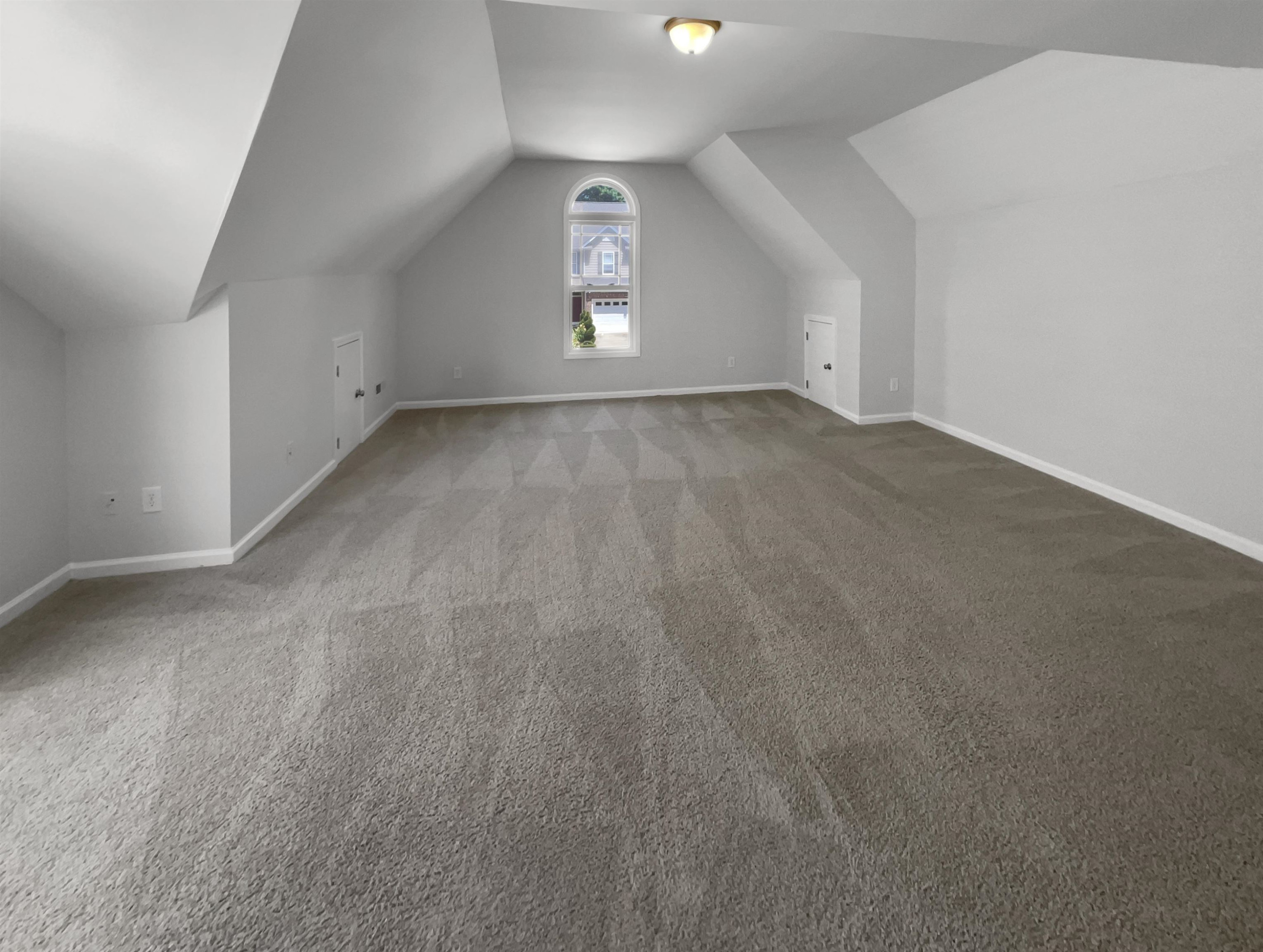 3154 Groveshire Drive Raleigh, NC 27616 - Photo 13 of 20 an empty room with a empty space and windows
