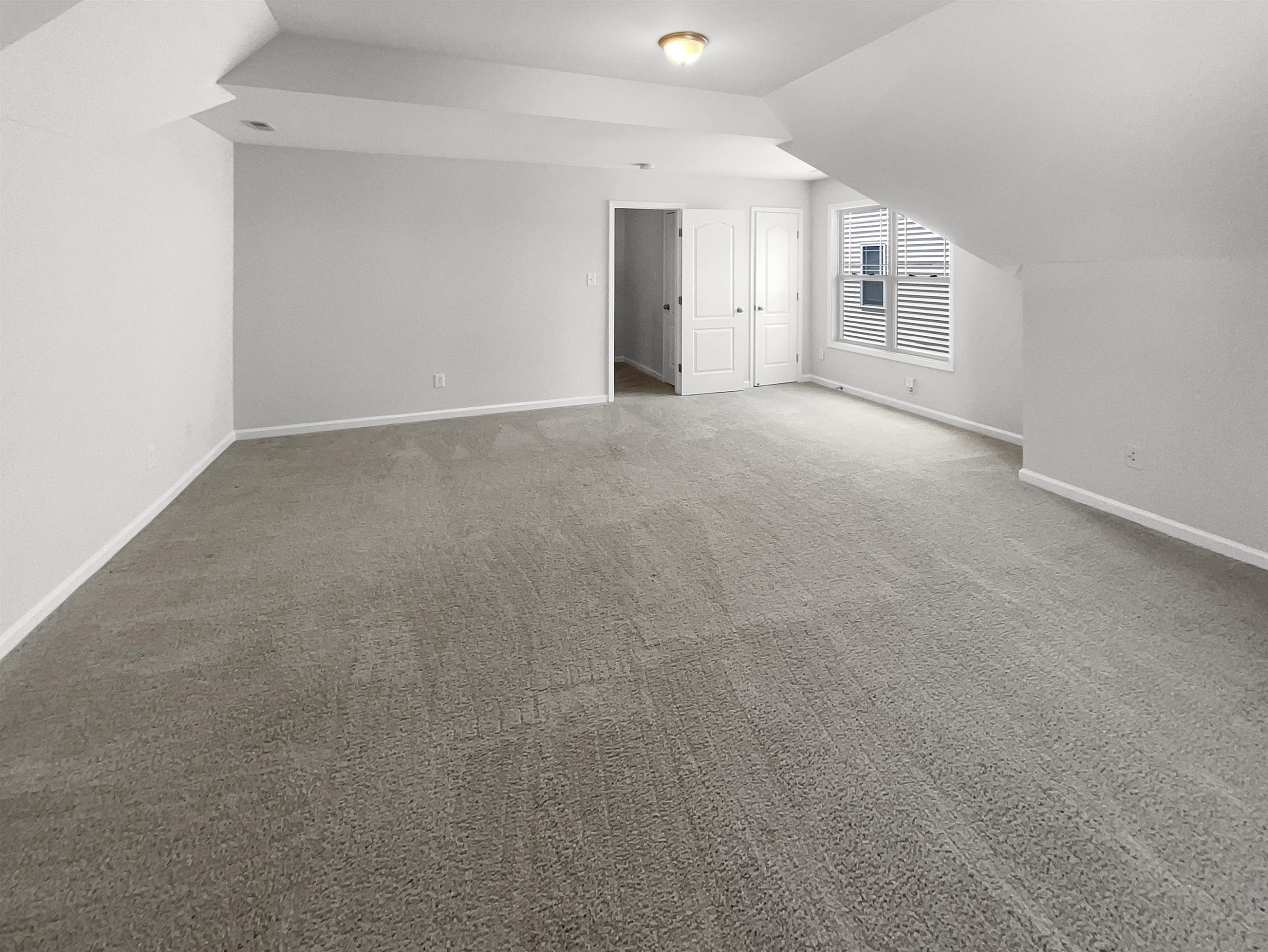 3154 Groveshire Drive Raleigh, NC 27616 - Photo 14 of 20 a view of an empty room with a window
