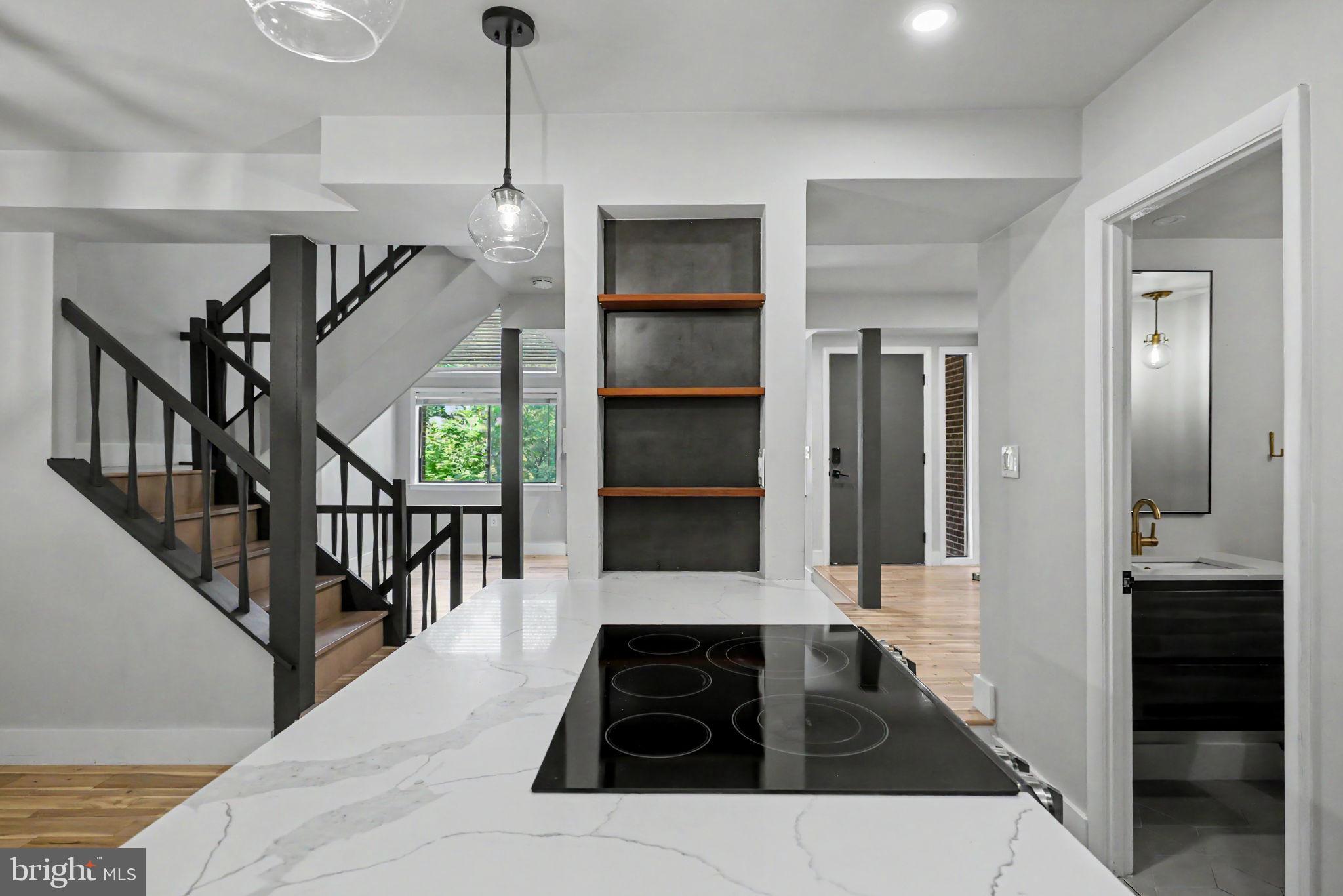 2105 Glencourse Lane Reston, VA 20191 - Photo 13 of 74 Electric stove on island