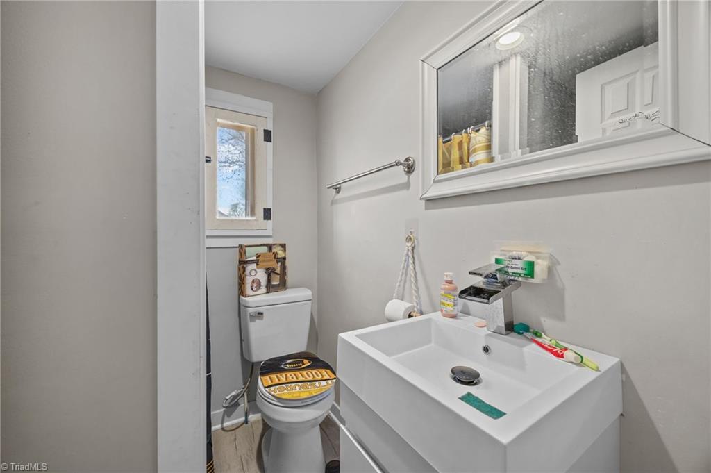 112 Briggs Place, Unit A & B High Point, NC 27262 - Photo 22 of 33 Full bathroom with single sink in Unit B.