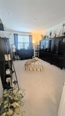 a view of a living room and bathroom