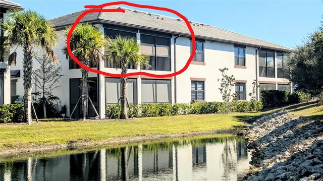 a view of a house with a swimming pool