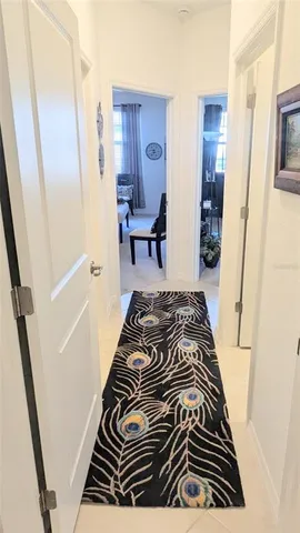 a bedroom with a bed and a mirror