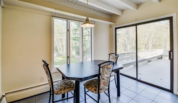 8 Plummer Road Boxford, MA 01921 - Photo 13 of 27 a view of a dining room with furniture and window