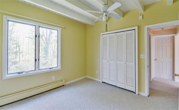 8 Plummer Road Boxford, MA 01921 - Photo 21 of 27 a view of a room that has a window in it