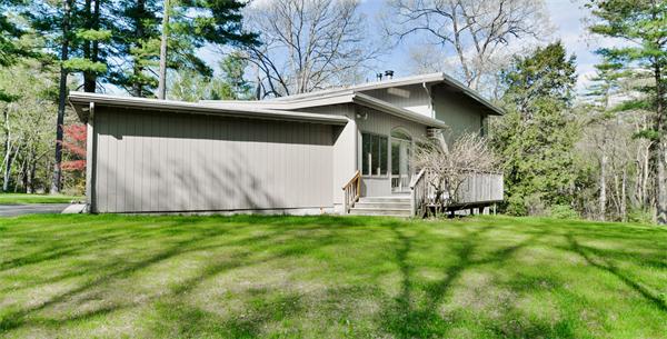 8 Plummer Road Boxford, MA 01921 - Photo 26 of 27 a view of backyard with a barn and large trees