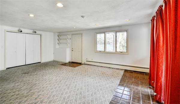 8 Plummer Road Boxford, MA 01921 - Photo 8 of 27 a view of an empty room and window