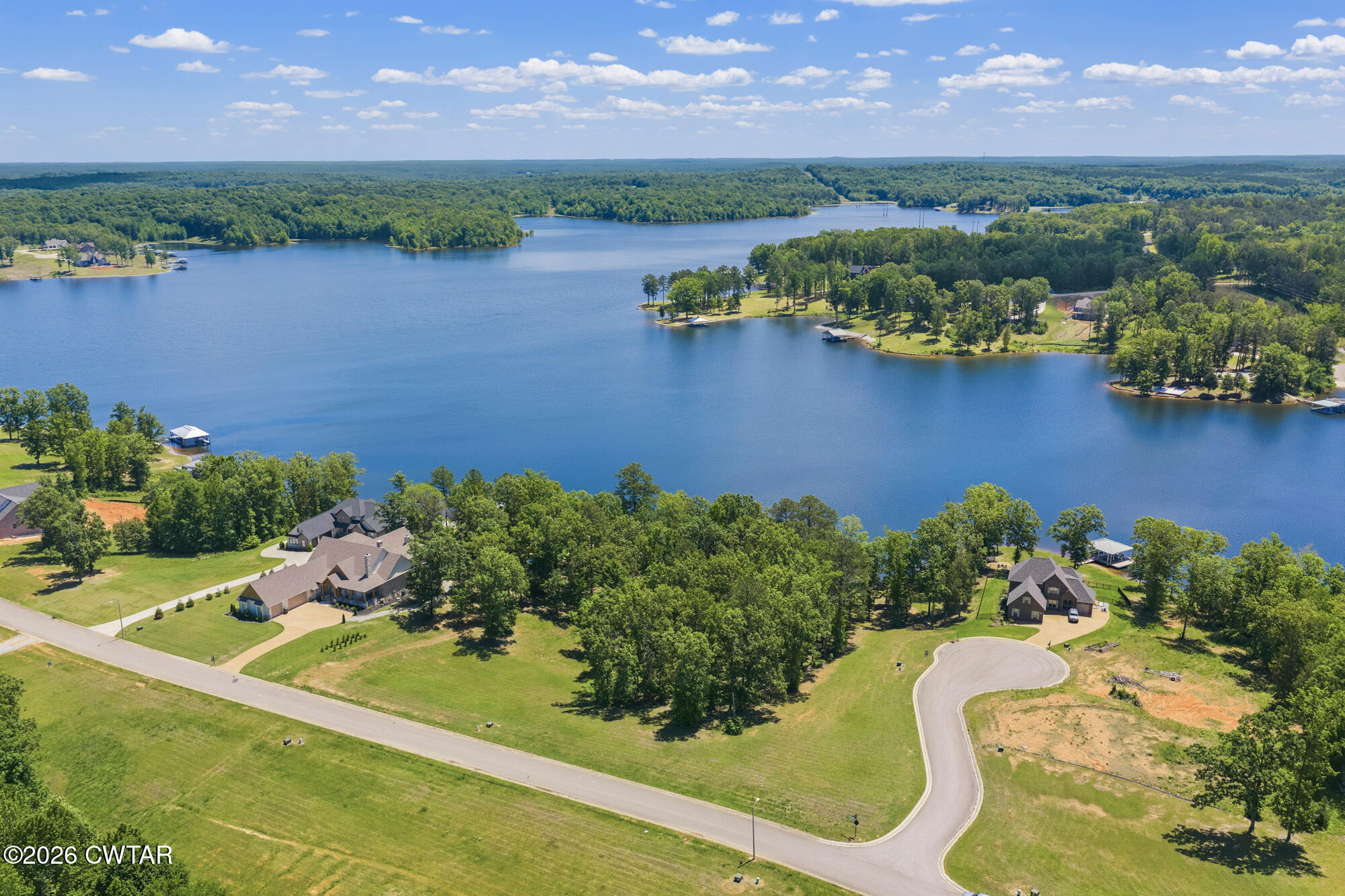 Lot 118 Kyle Road Huntingdon, TN 38344 - Photo 15 of 16 an aerial view of a houses with a lake view