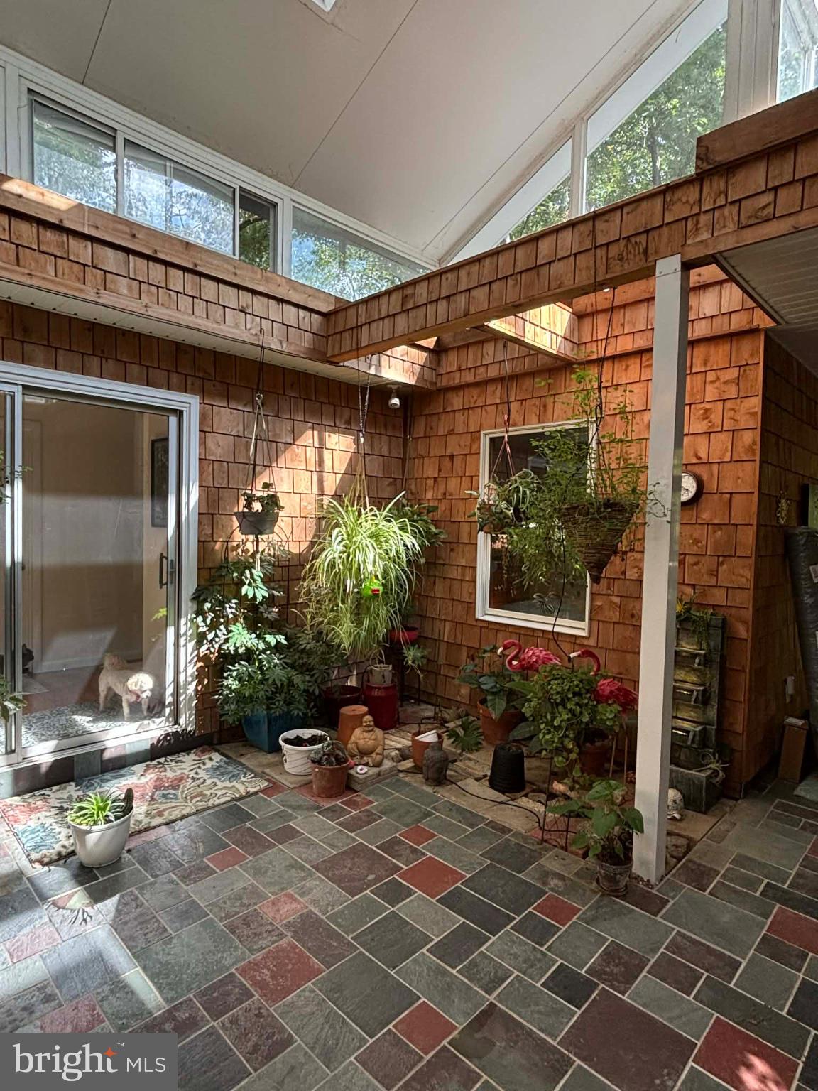 4660 Oley Turnpike Road Reading, PA 19606 - Photo 10 of 13 Lush greenery in a sunlit atrium.