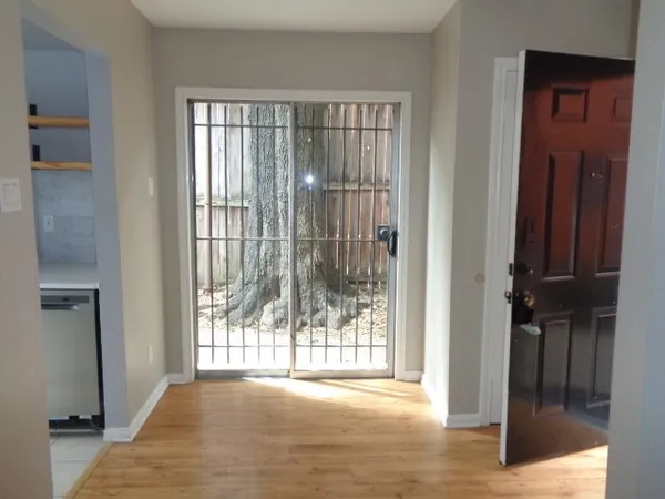 a view of a room that has a large window