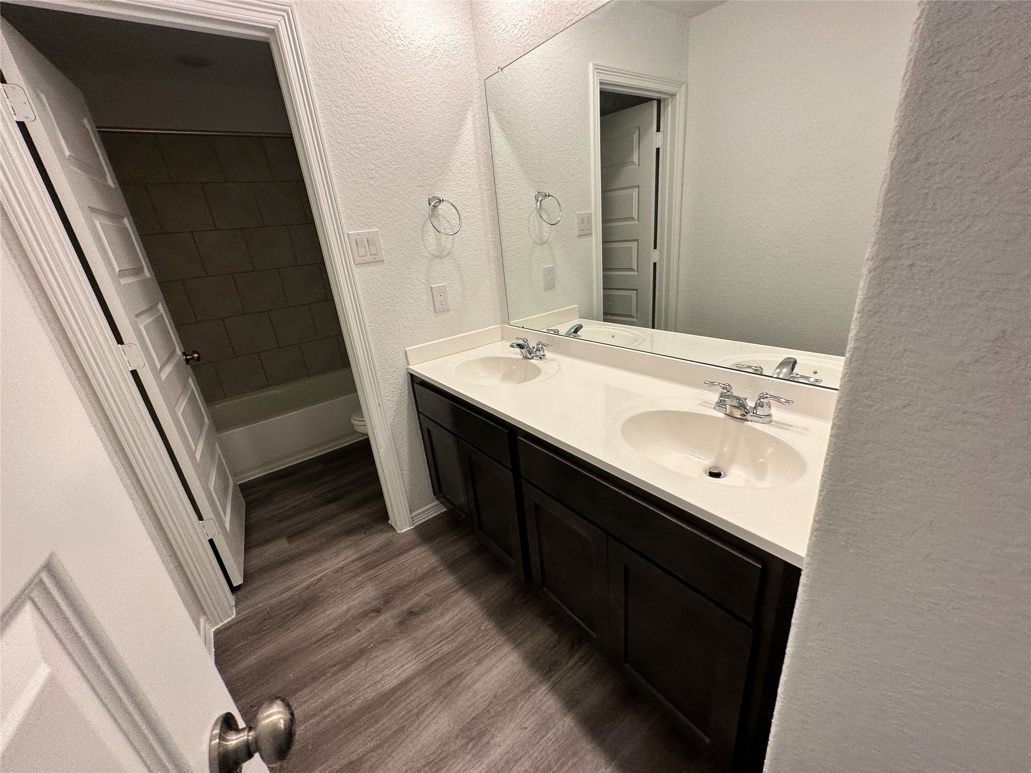 16572 Moss Lane Porter, TX 77365 - Photo 11 of 17 a bathroom with a double vanity sink and a mirror