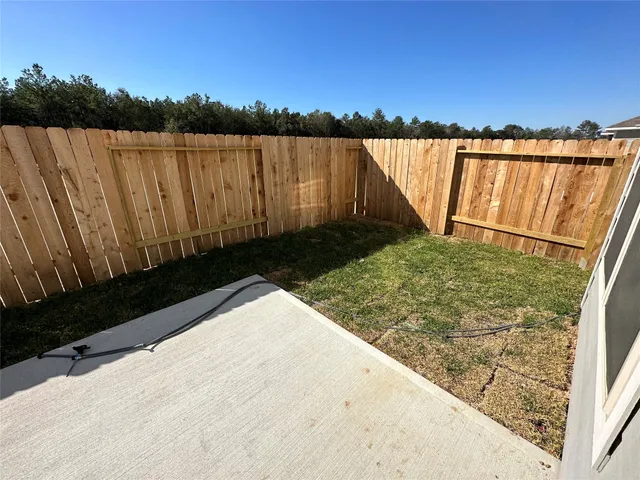 a view of balcony with wooden floor and lake view