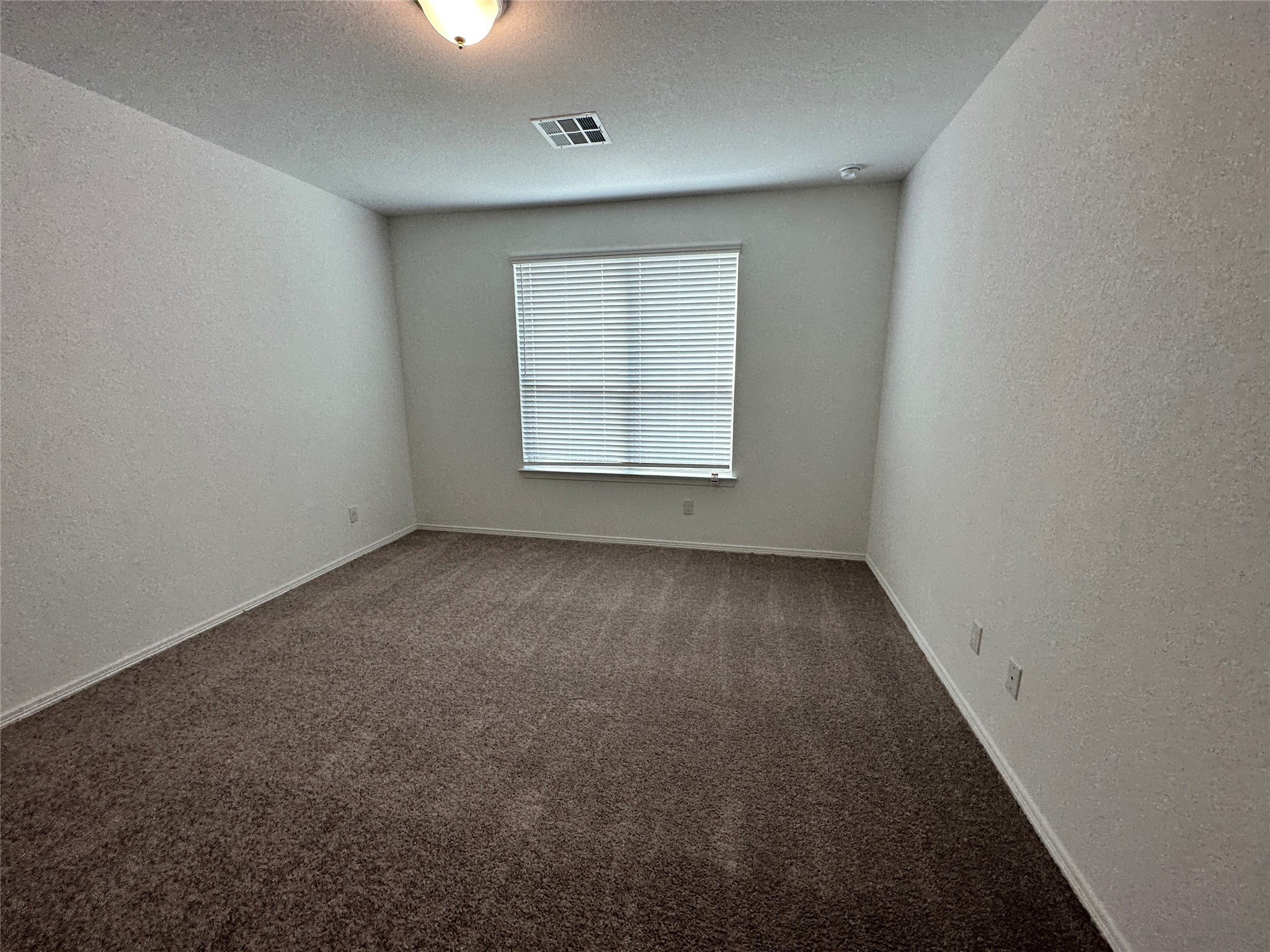 16572 Moss Lane Porter, TX 77365 - Photo 5 of 17 an empty room with a window