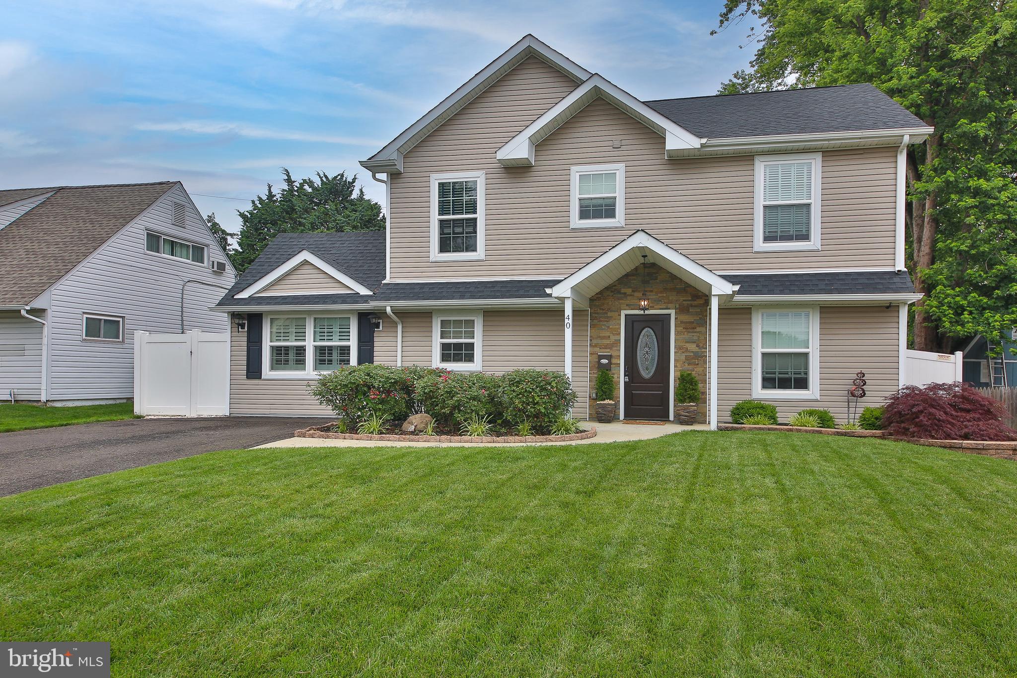 40 Greenbriar Road Levittown, PA 19057 - Photo 1 of 29 a front view of a house with a yard