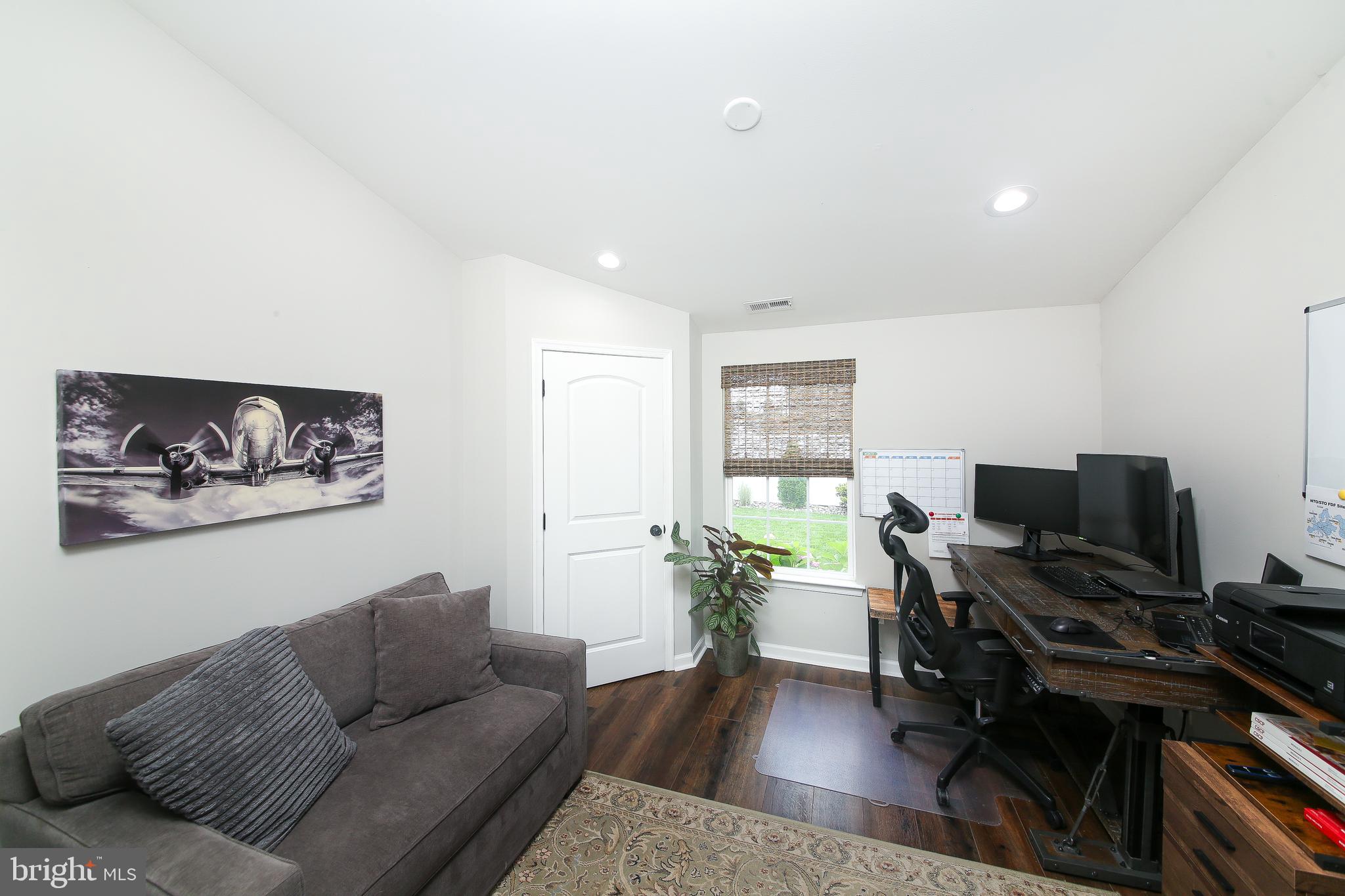 40 Greenbriar Road Levittown, PA 19057 - Photo 13 of 29 a living room with furniture and a flat screen tv