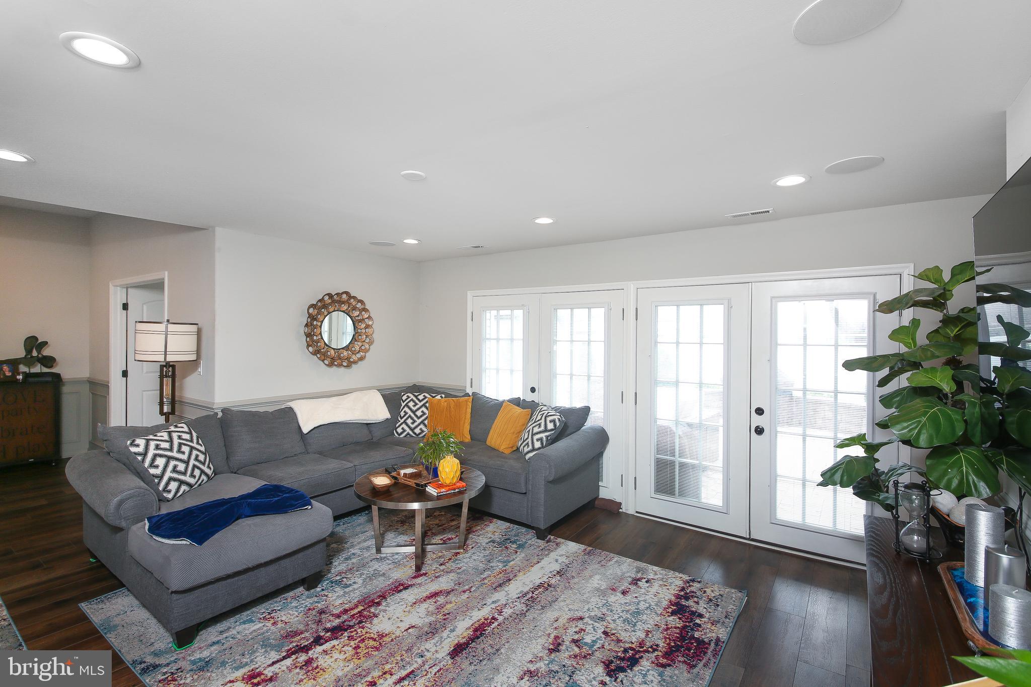 40 Greenbriar Road Levittown, PA 19057 - Photo 6 of 29 a living room with furniture and a potted plant