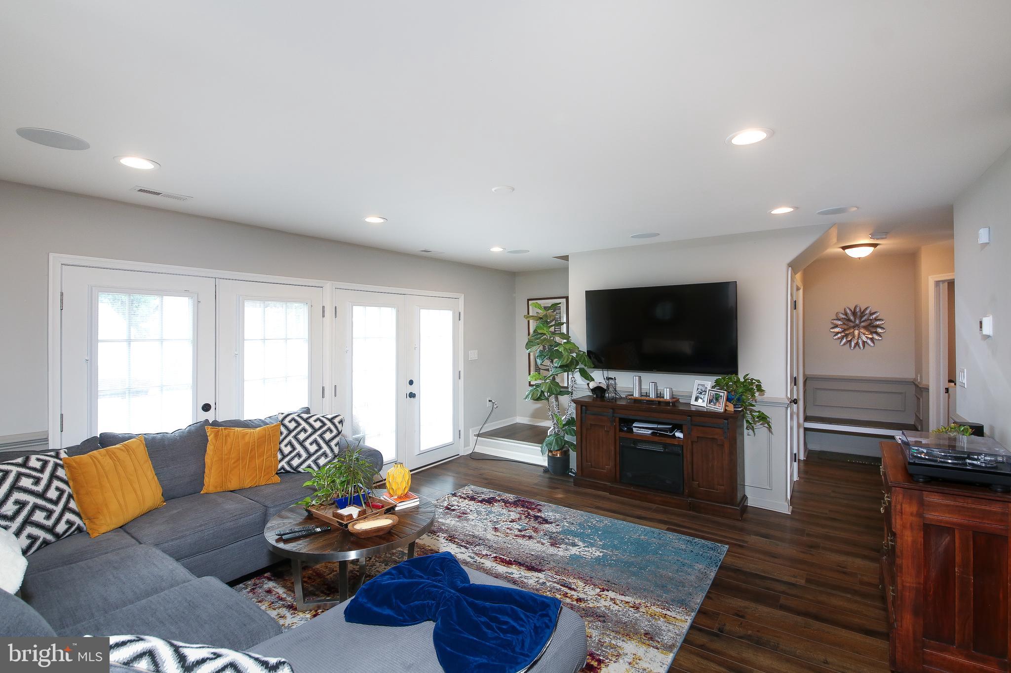 40 Greenbriar Road Levittown, PA 19057 - Photo 7 of 29 a living room with furniture and a flat screen tv