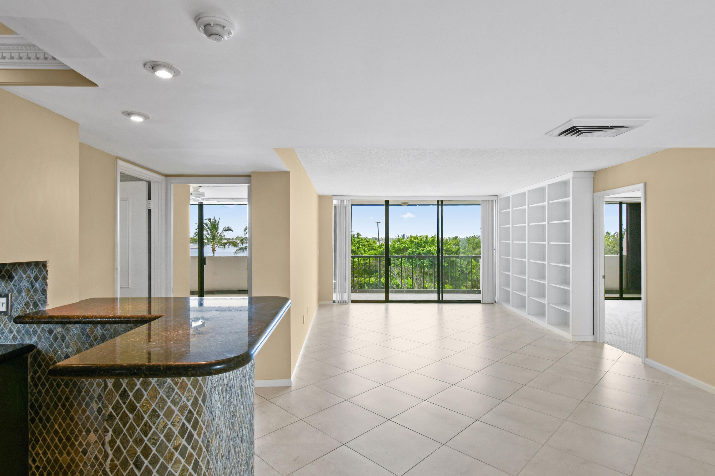 5200 North Flagler Drive, Unit 404 West Palm Beach, FL 33407 - Photo 11 of 33 a view of a livingroom with furniture window and front door