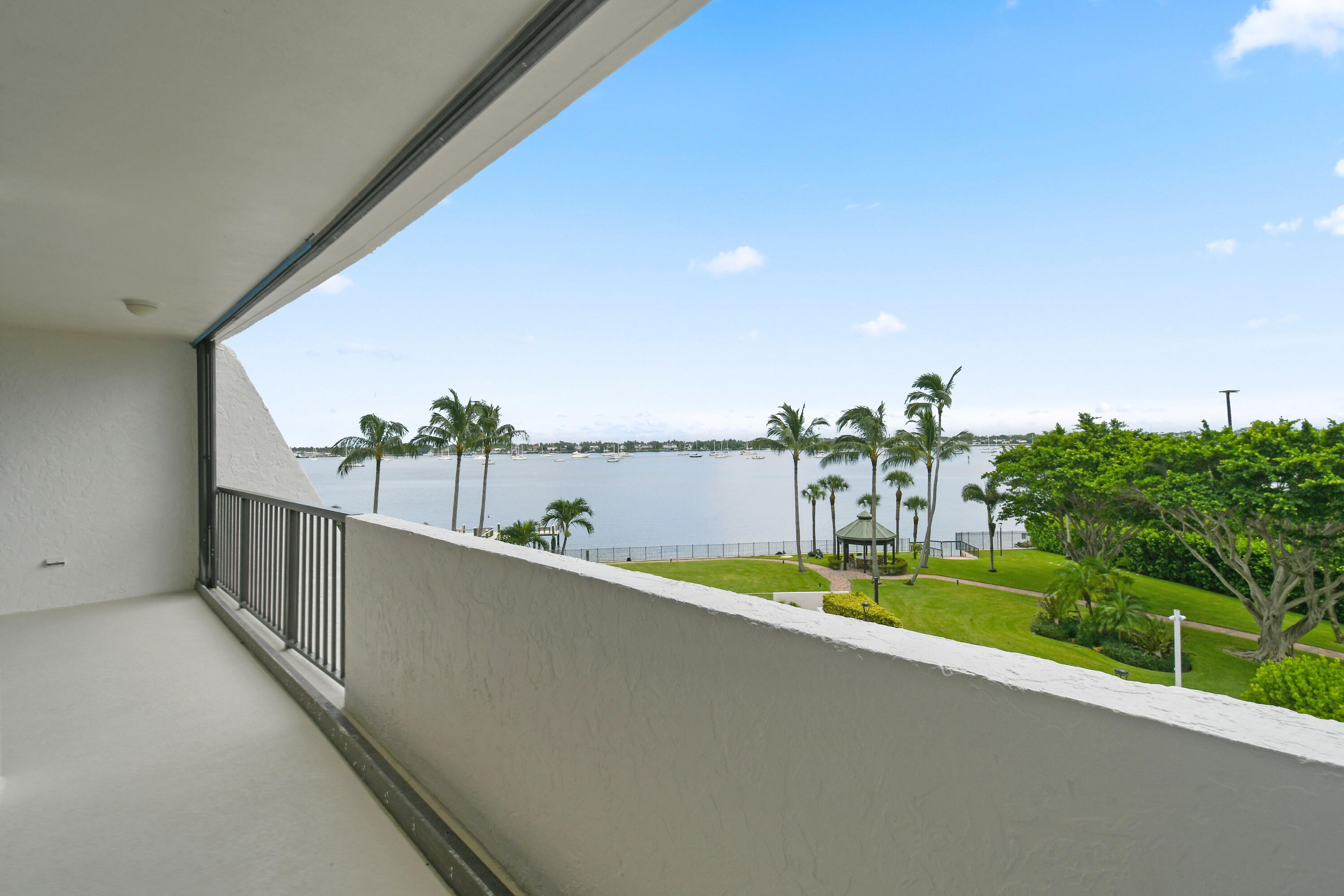 5200 North Flagler Drive, Unit 404 West Palm Beach, FL 33407 - Photo 22 of 33 a view of a balcony with ocean view