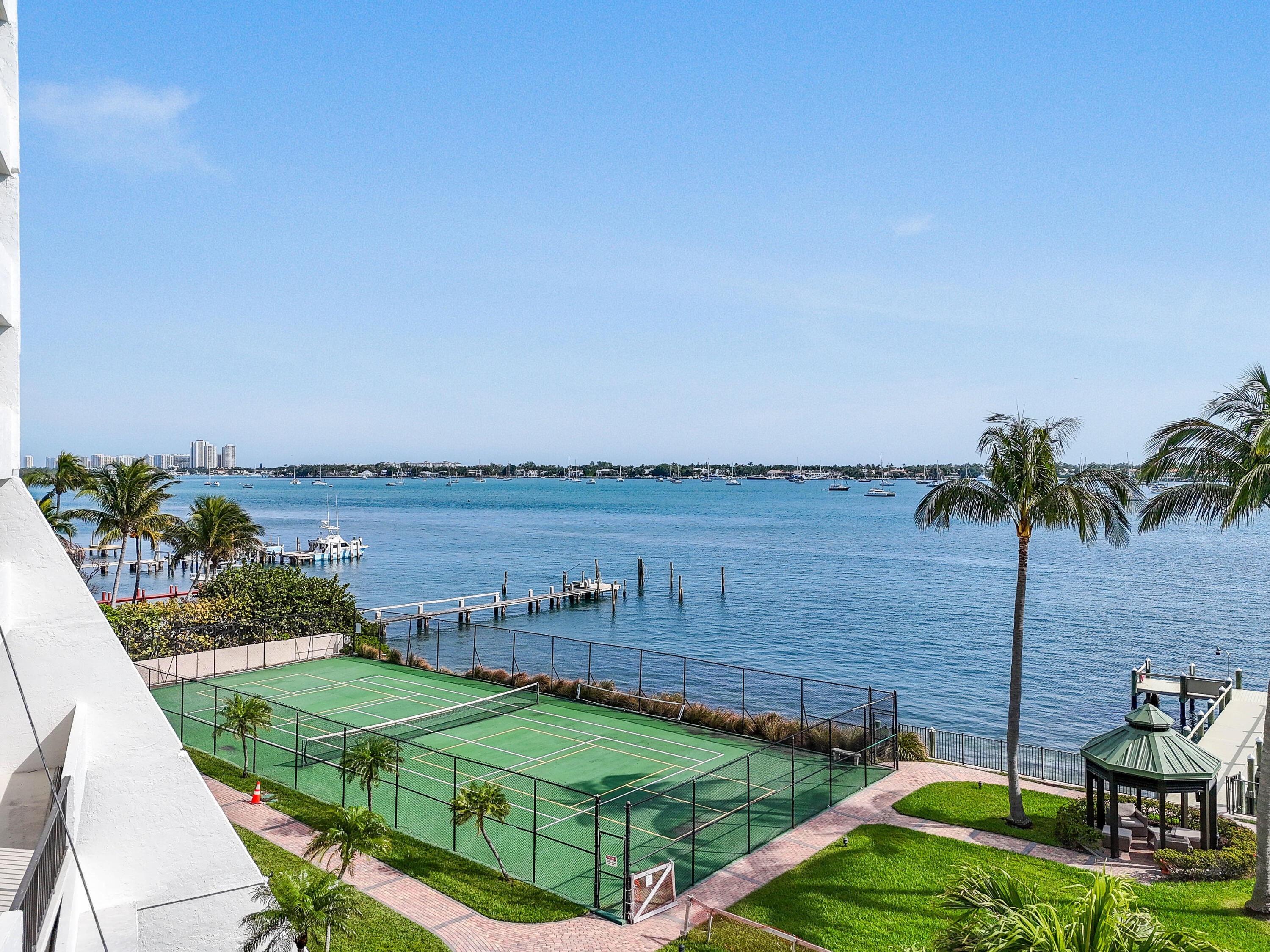 5200 North Flagler Drive, Unit 404 West Palm Beach, FL 33407 - Photo 26 of 33 a view of a garden with a lake view