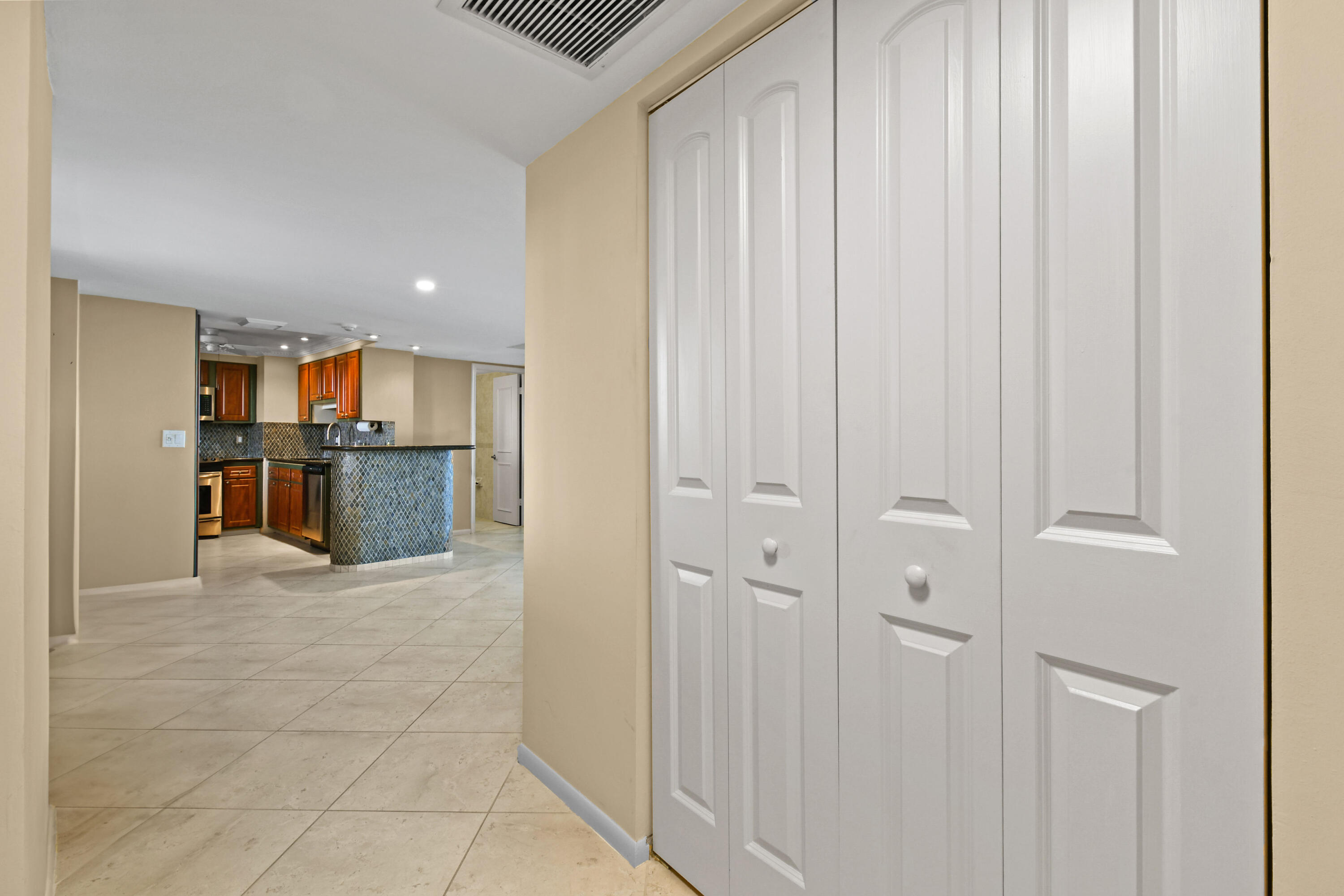 5200 North Flagler Drive, Unit 404 West Palm Beach, FL 33407 - Photo 3 of 33 a view of a kitchen with a sink