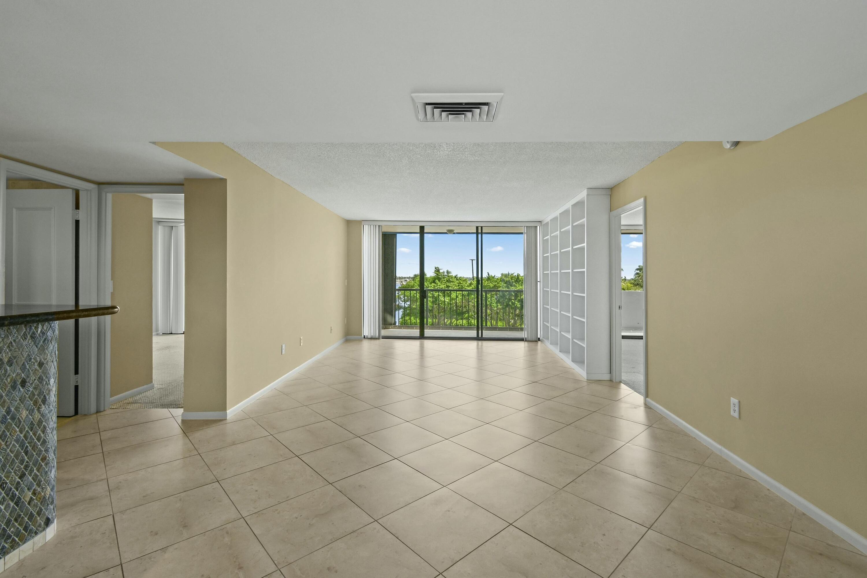 5200 North Flagler Drive, Unit 404 West Palm Beach, FL 33407 - Photo 5 of 33 a view of an empty room with a window