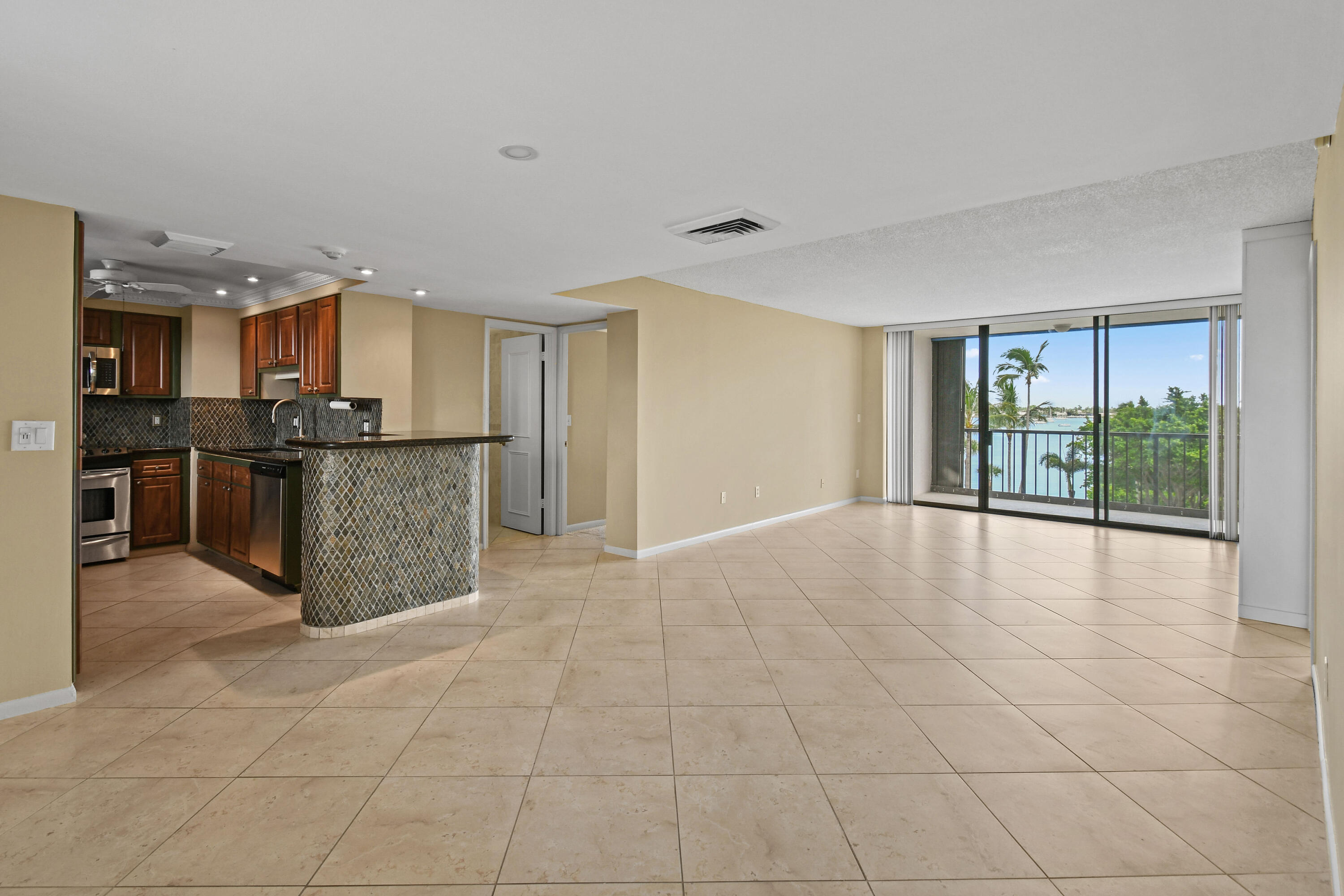 5200 North Flagler Drive, Unit 404 West Palm Beach, FL 33407 - Photo 6 of 33 a view of a kitchen with a sink