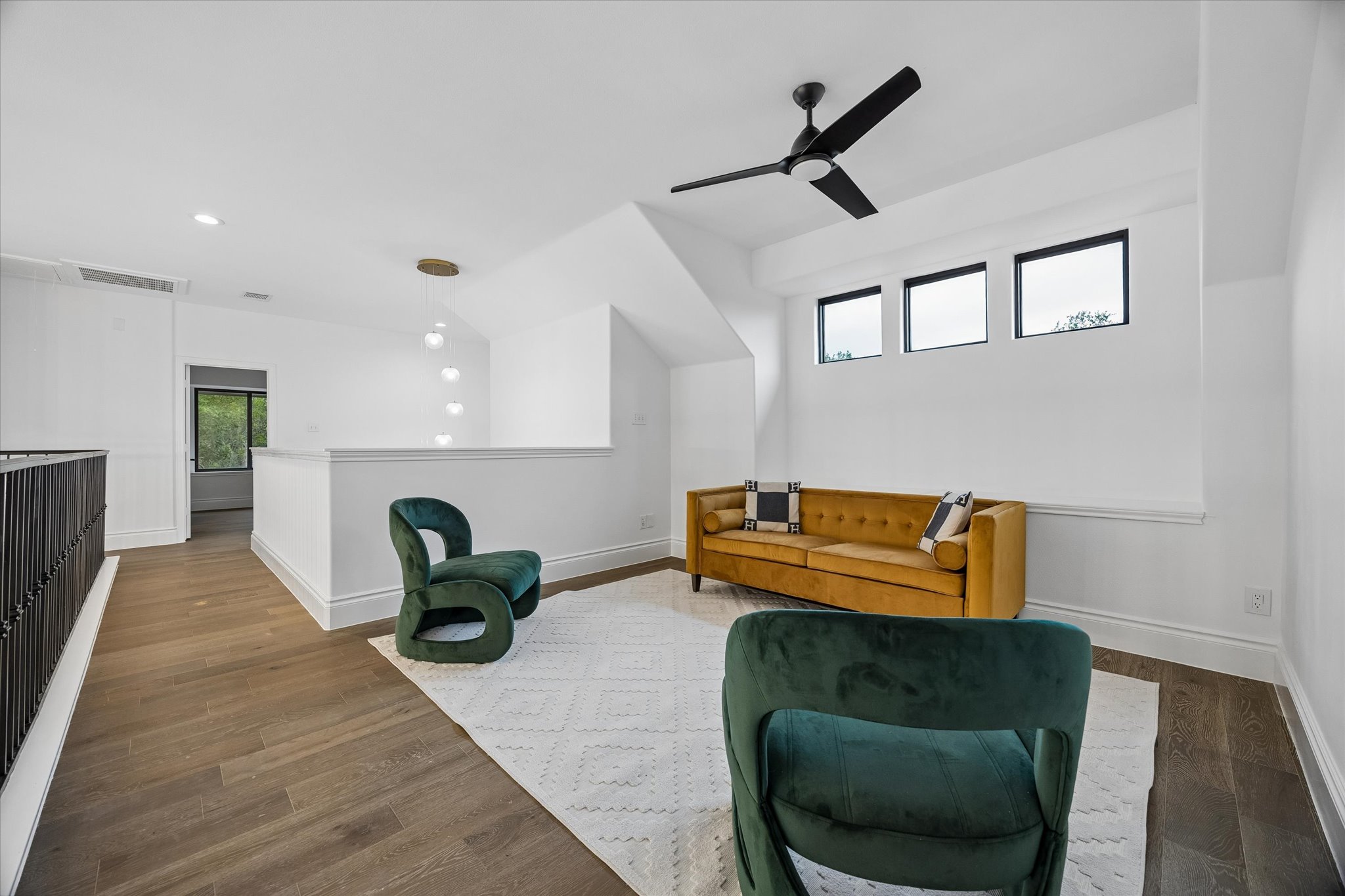 3719 Bee Creek Road Spicewood, TX 78669 - Photo 19 of 40 Lofty ceilings and a vibrant color palette create an inviting and open living space.