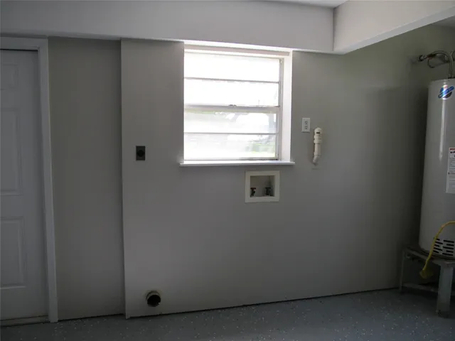 a view of a room that has a window in it