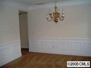 2423 Blueberry Ridge Road Matthews, NC 28105 - Photo 2 of 8 a view of a chandelier fan and window in a room