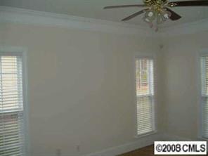 2423 Blueberry Ridge Road Matthews, NC 28105 - Photo 6 of 8 a view of an empty room and a window