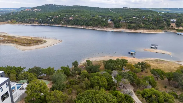 an aerial view of residential house and green space